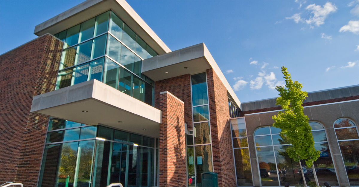The brick and glass entrance of the Ohio University Lancaster campus