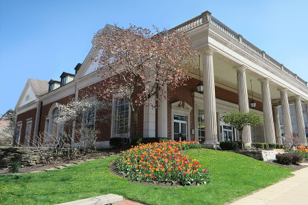 bank building front with flowers