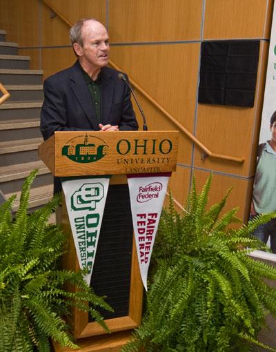 man standing to give speach